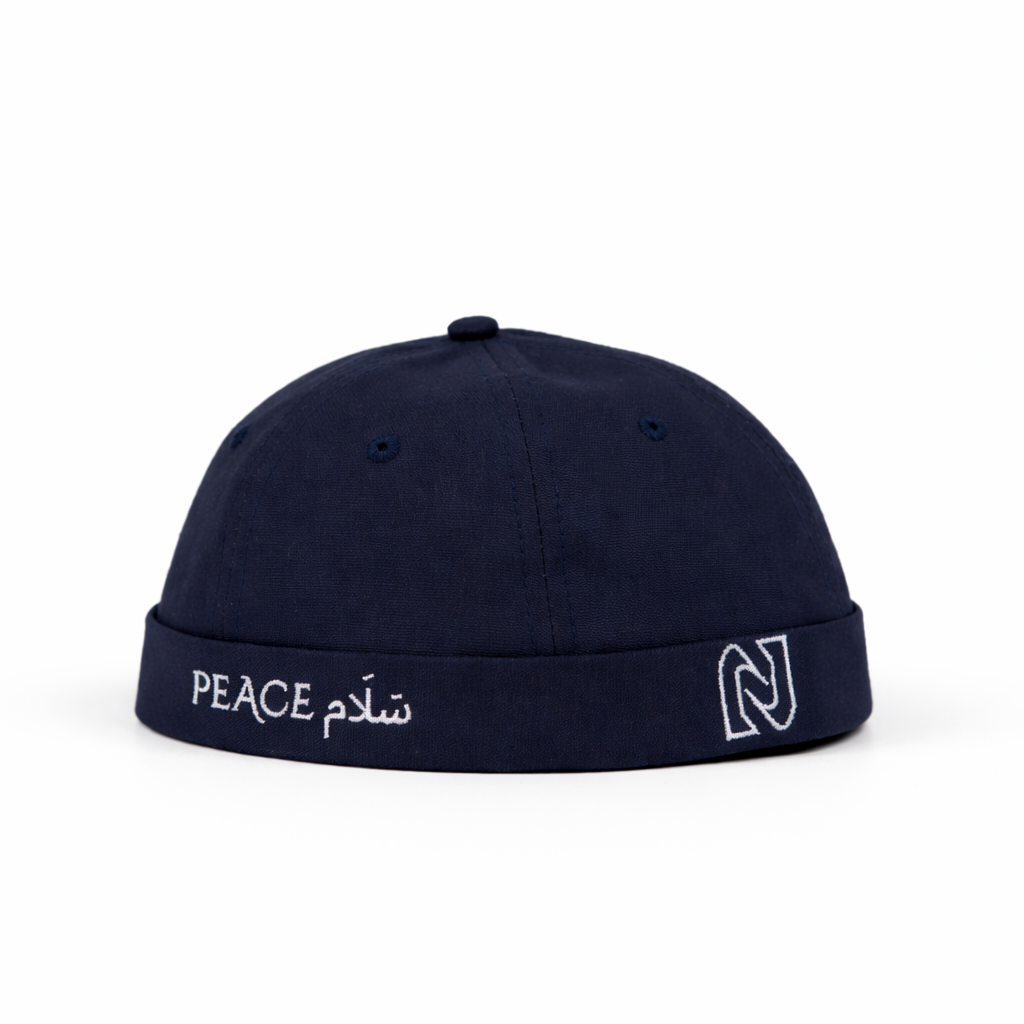 Navy blue cap with white text and logo on a white background