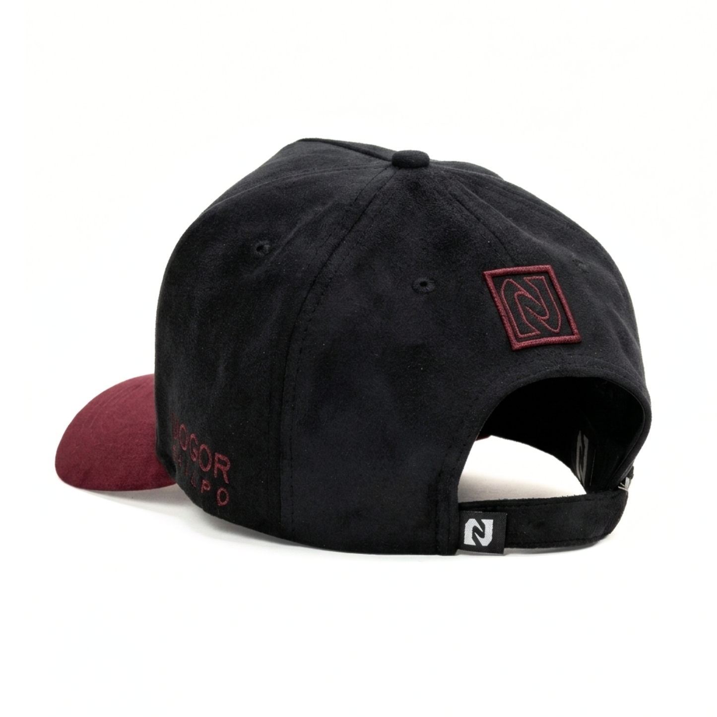 Black cap with red logo and text on a white background