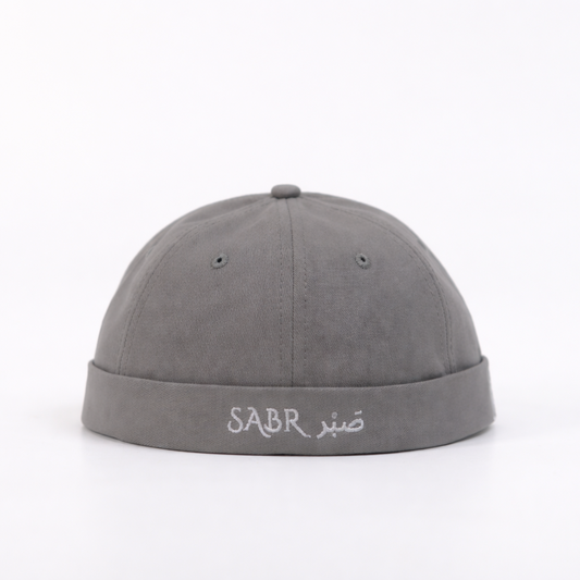 Gray cap with 'SABR' text on a white background