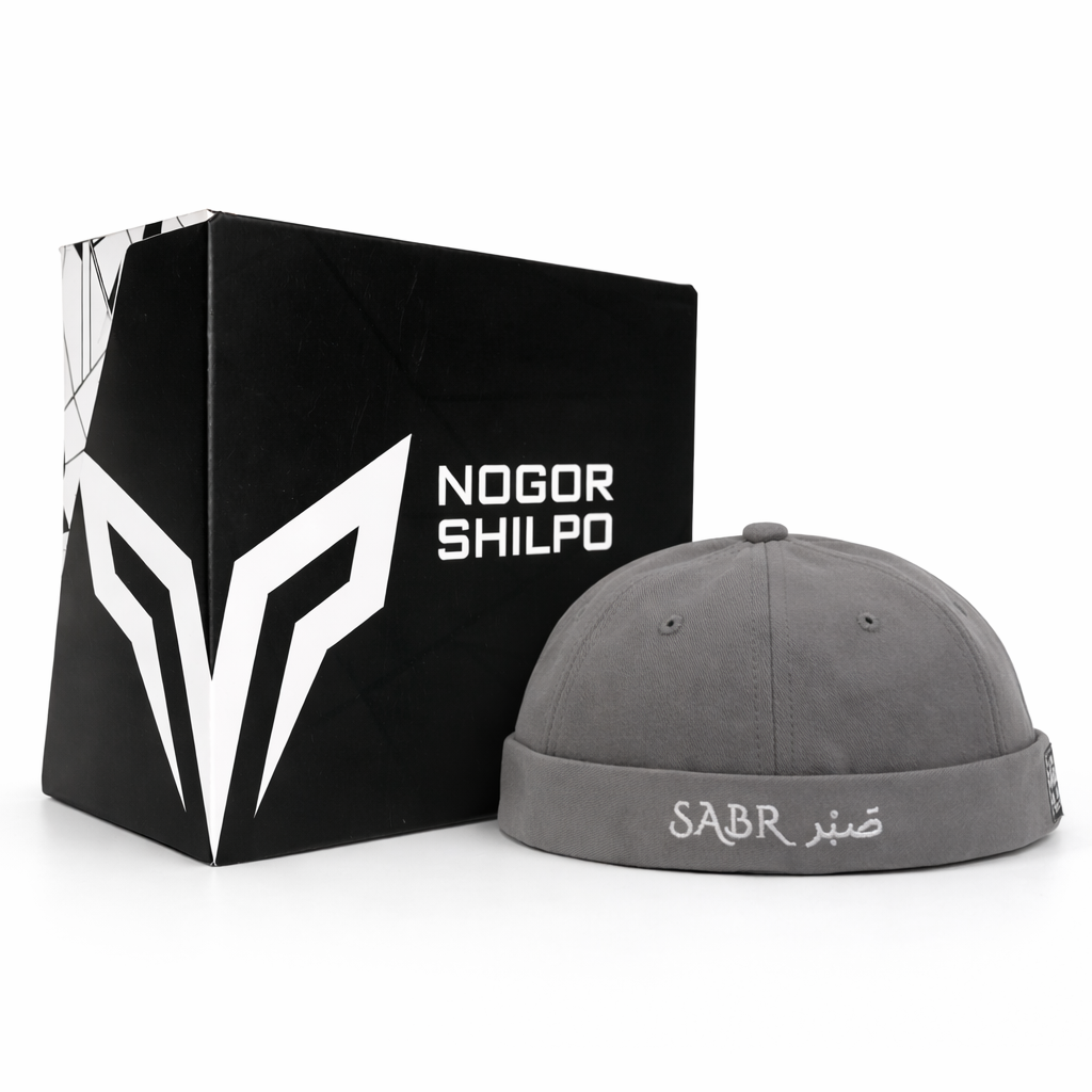 Gray cap with 'SABR' branding next to a black box with 'Nogor Shilpo' branding on a white background