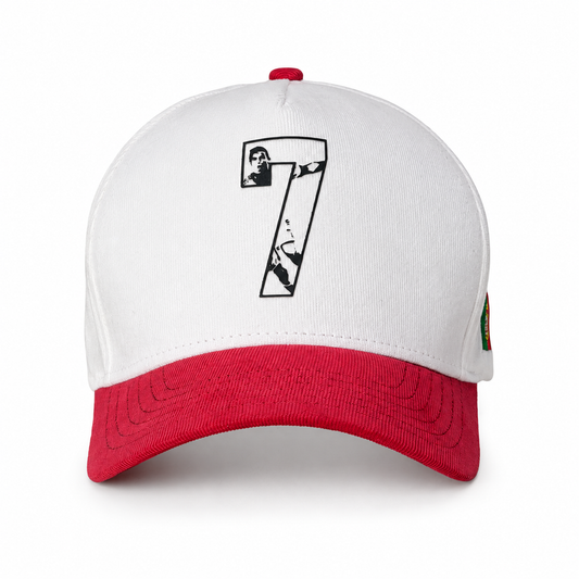 White cap with red brim and black number 7 design on a white background