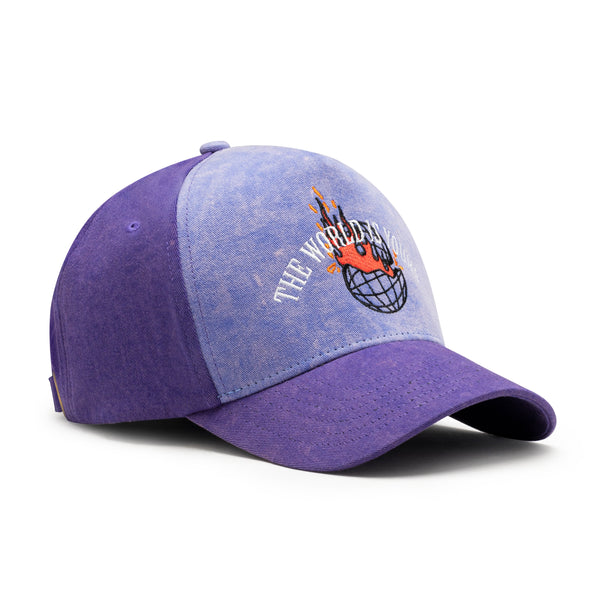 Purple and blue baseball cap with graphic design on a white background