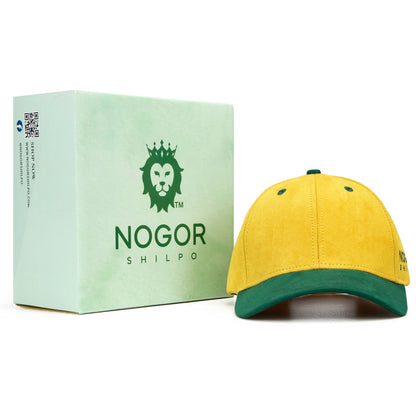 Yellow and green cap with Nogor Shilpo box on a white background