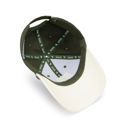 Baseball cap with green front and white back on a white background