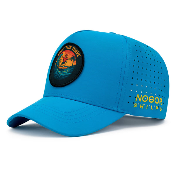 Blue cap with a patch and 'Nogor Shilpu' branding on a white background