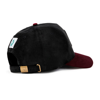 Black and maroon baseball cap with a gold buckle on a white background