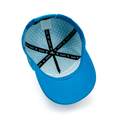 Blue cap with a white interior and black branding on a white background