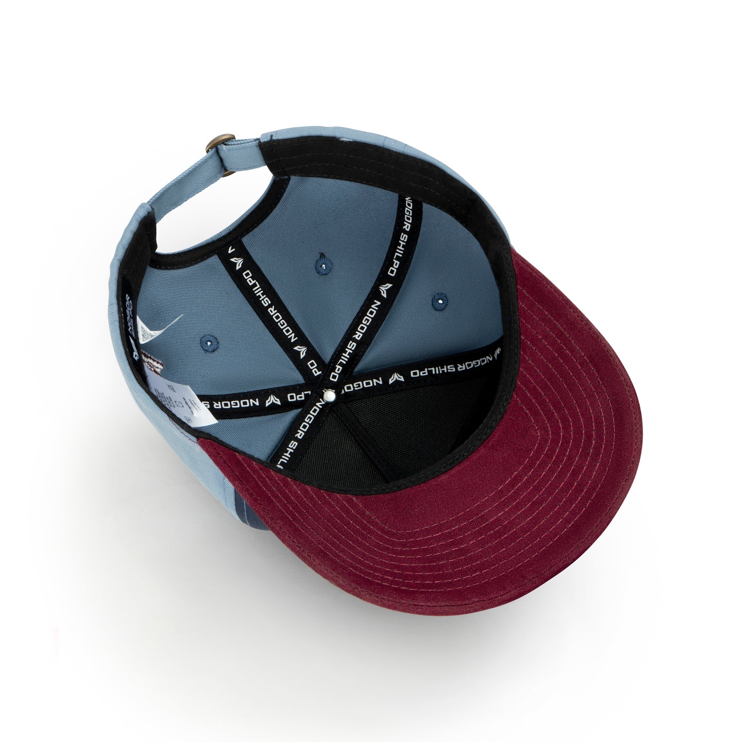 Two baseball caps, one gray and one burgundy, on a white background.