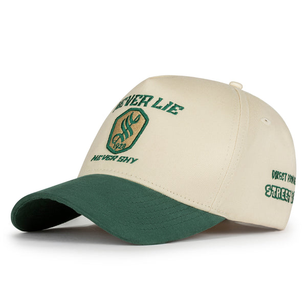 Two-tone cap with green and beige colors on a white background