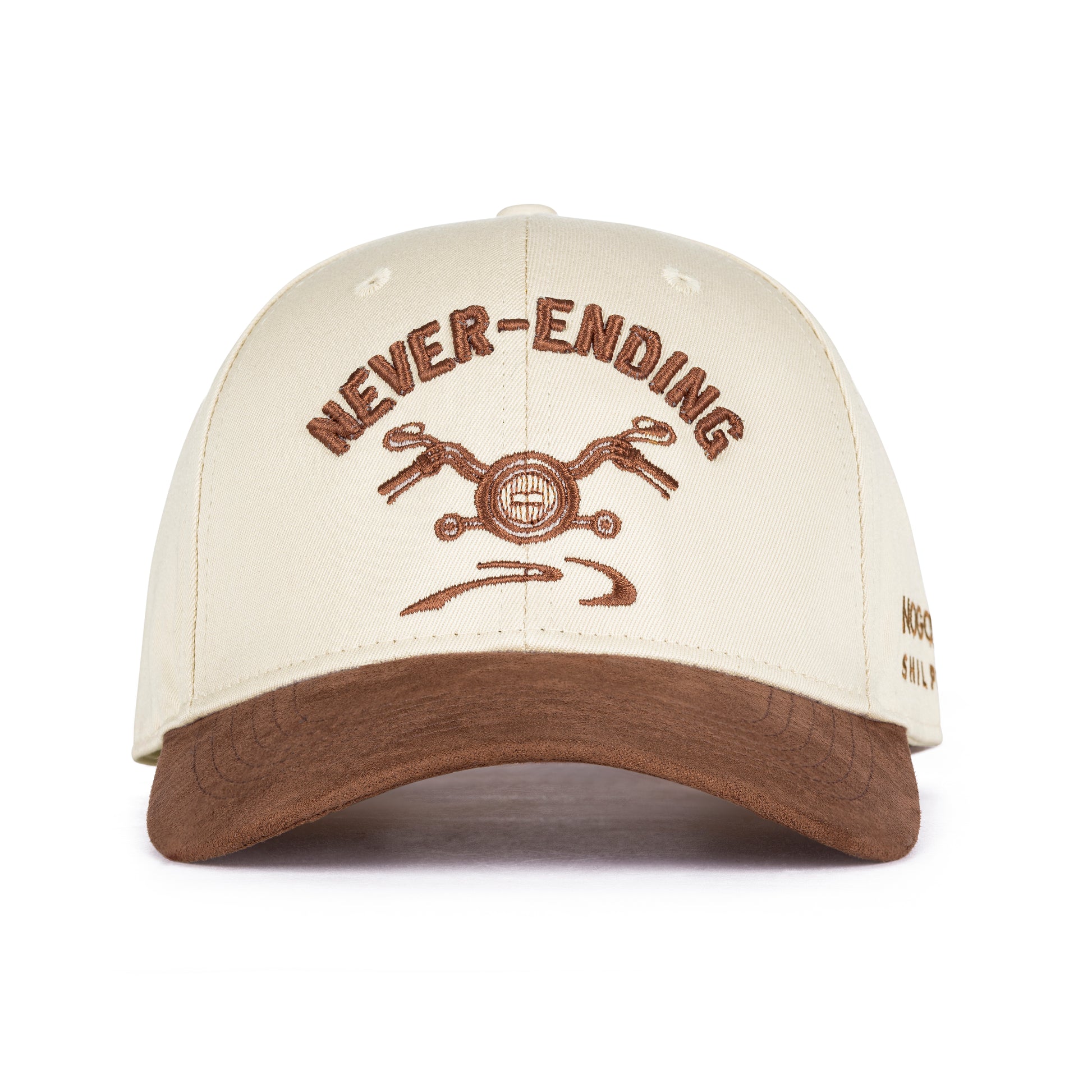 Beige cap with brown embroidered text and design on a white background
