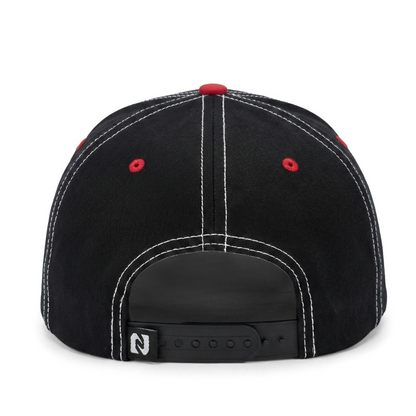 Black cap with red buttons on a white background