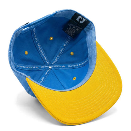 Blue and yellow cap on a white background