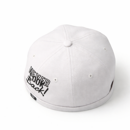 White cap with text on a white background