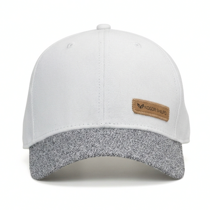 White and gray cap with a brown logo patch on a white background