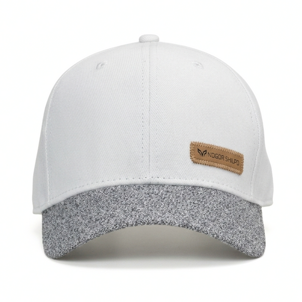 White and gray cap with a brown logo patch on a white background