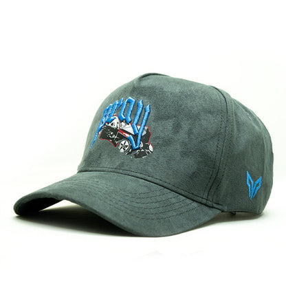 Green cap with embroidered design on a white background