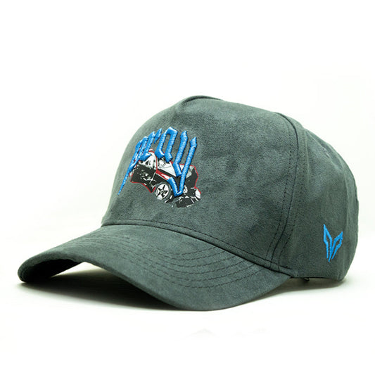 Green cap with embroidered design on a white background