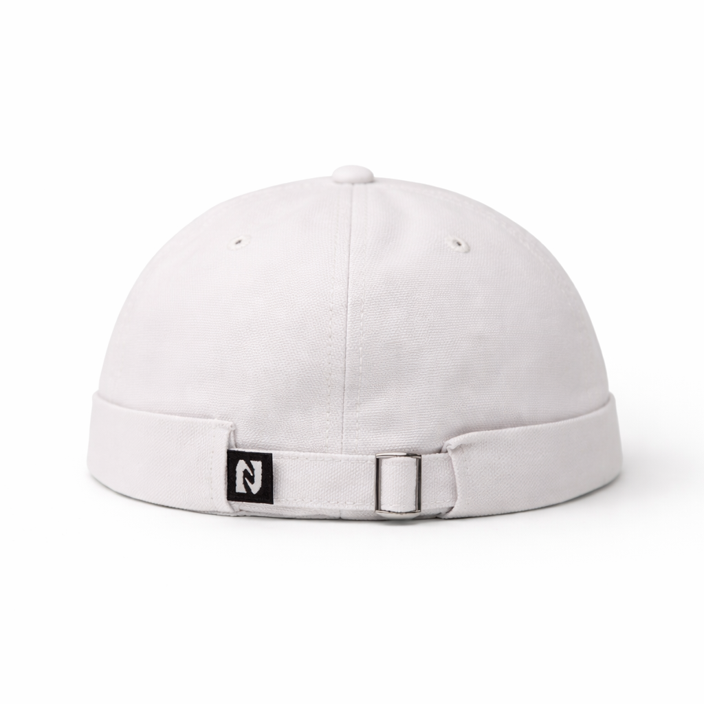 White cap with a small logo on a white background