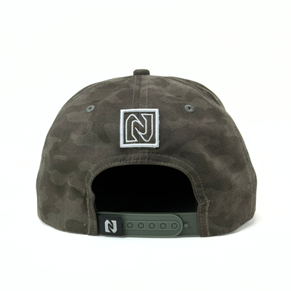 Camouflage-patterned cap with a logo on the back against a white background