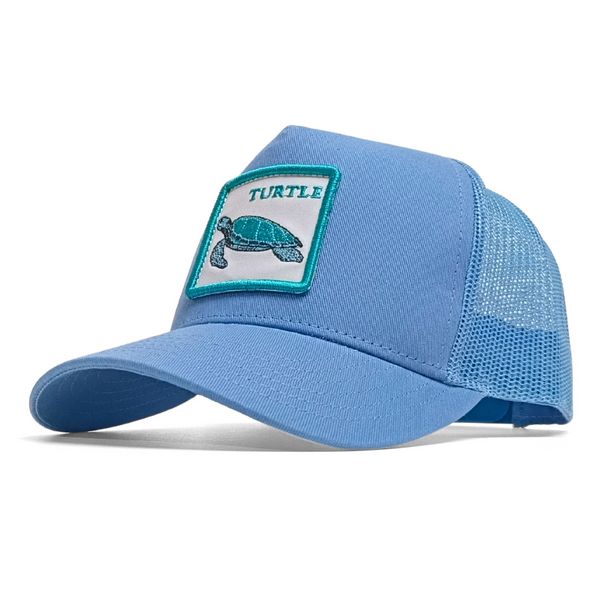 Blue cap with a turtle patch on a white background