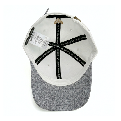 Back view of a cap with branding on a white background