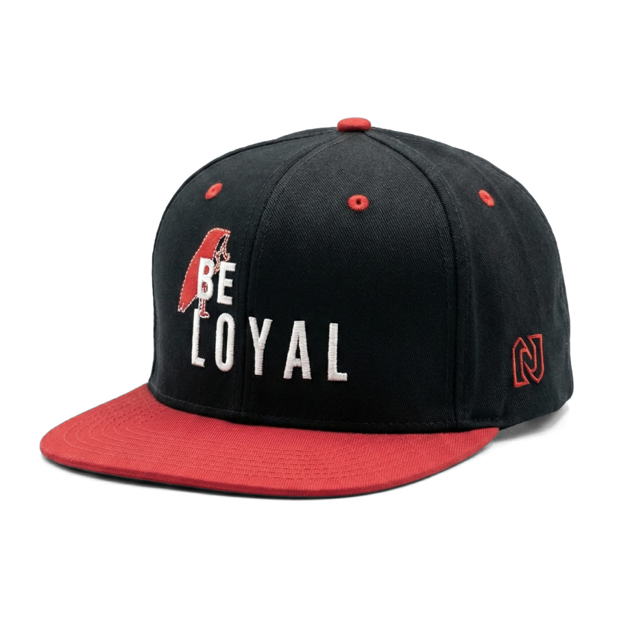Black and red cap with 'Be Loyal' text on a white background