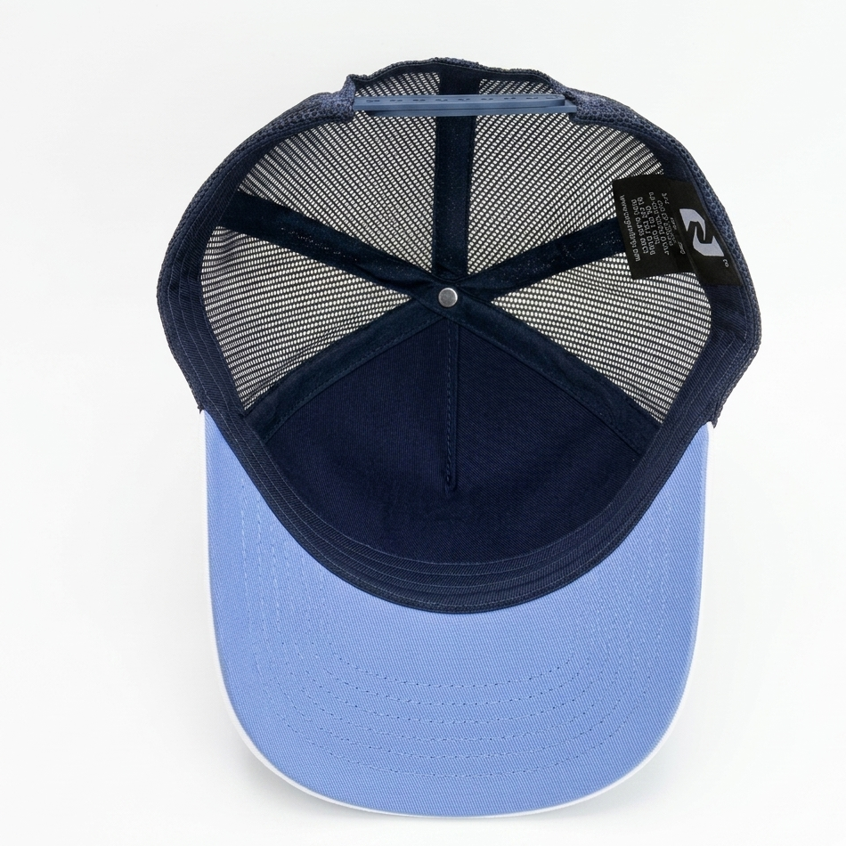 Blue baseball cap with mesh back on a white background