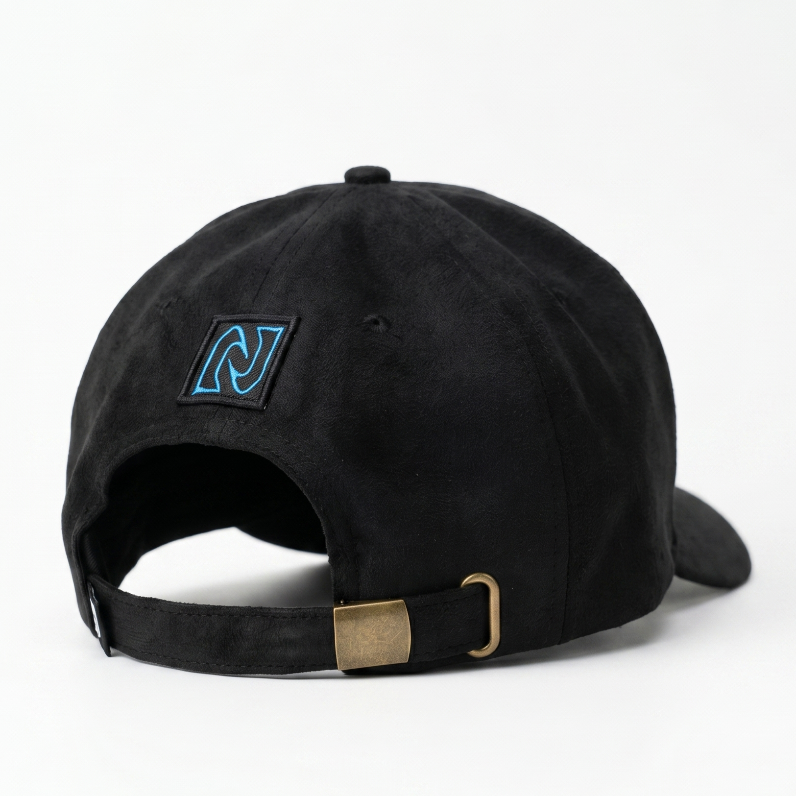 Black cap with a blue logo and gold tag on a white background