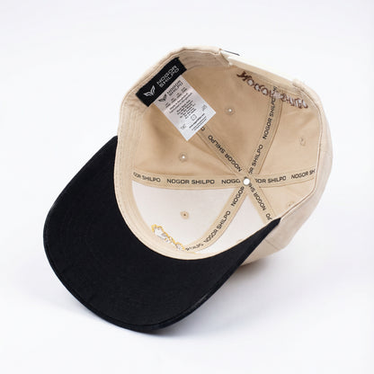 Two baseball caps, one black and one beige, with visible branding on a white background.