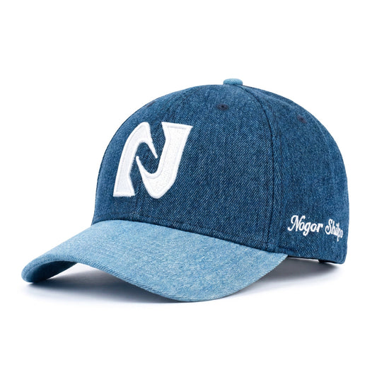 Blue denim cap with a white logo on a white background