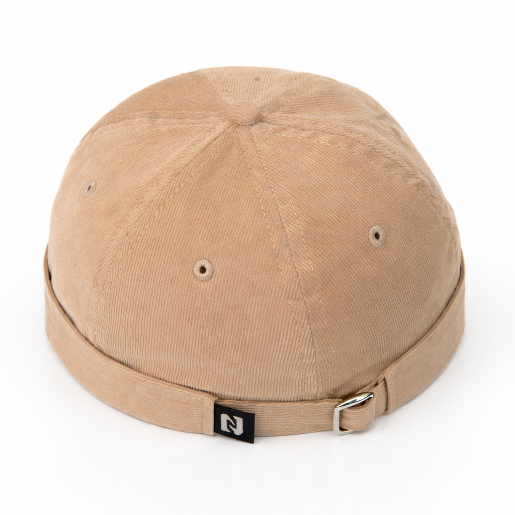 Beige cap with a brand logo on a white background