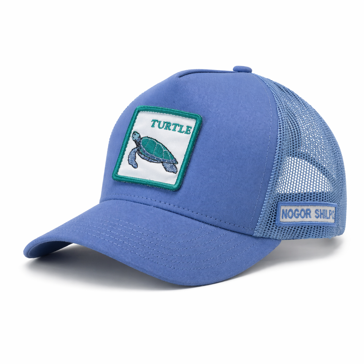 Blue cap with turtle patch and 'Nogor Shipyards' branding on a white background