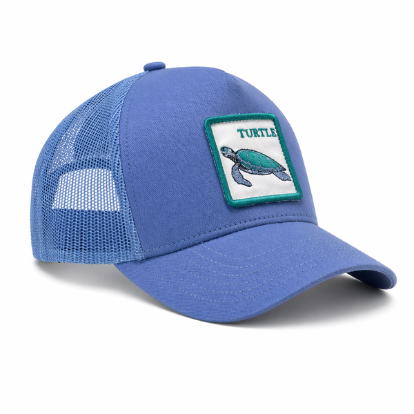 Blue cap with a turtle patch on a white background