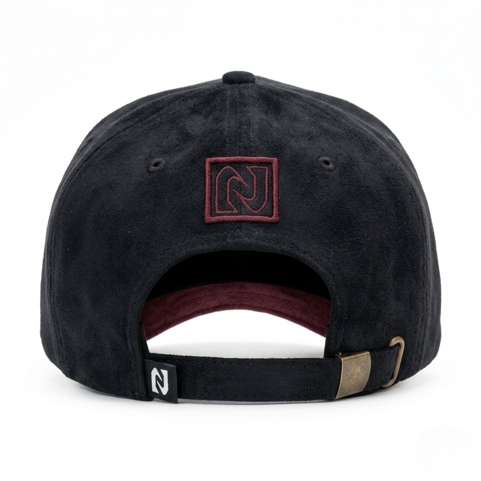 Black cap with a logo on the back against a white background