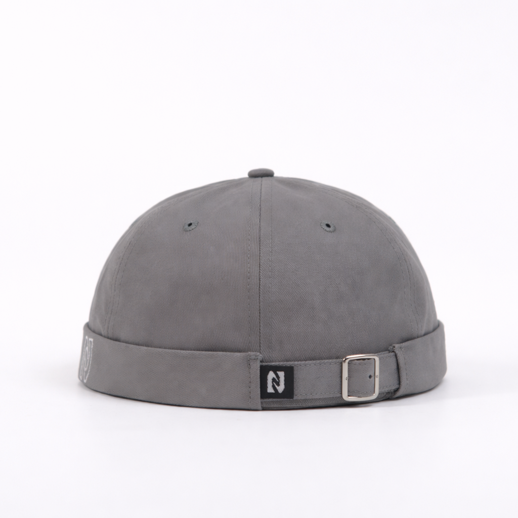 Gray cap with a brand logo on a white background