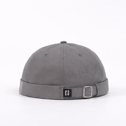 Gray cap with a brand logo on a white background