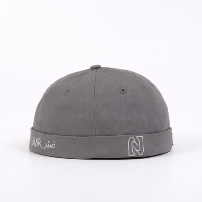 Gray cap with branding on a white background