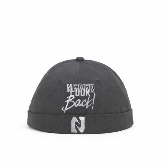Gray cap with 'Never Look Back!' text on a white background