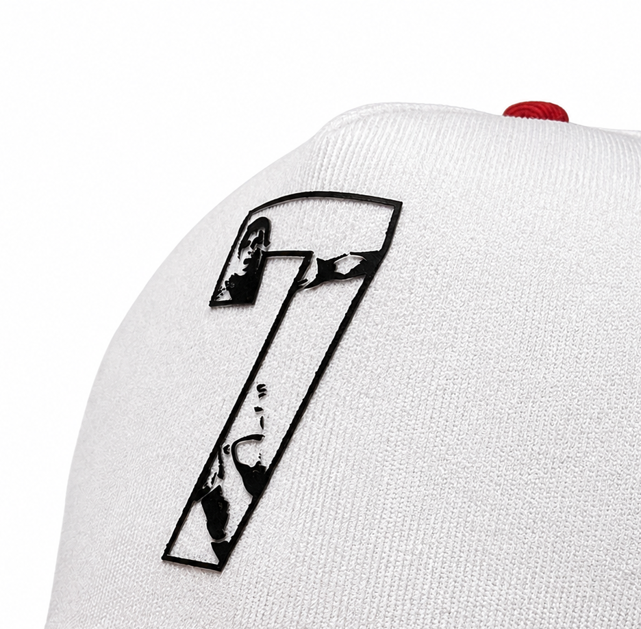 White cap with a black number 7 design on a white background