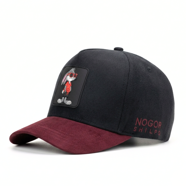 Black and red baseball cap with a patch and brand name on a white background
